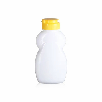 La compression en plastique claire adaptée aux besoins du client met petit Honey Jugs en bouteille réutilisable 110ml